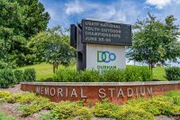Brick and digital marquee sign for Durham Memorial Stadium